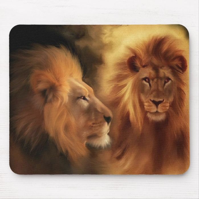 two lions are facing each other in front of a golden background