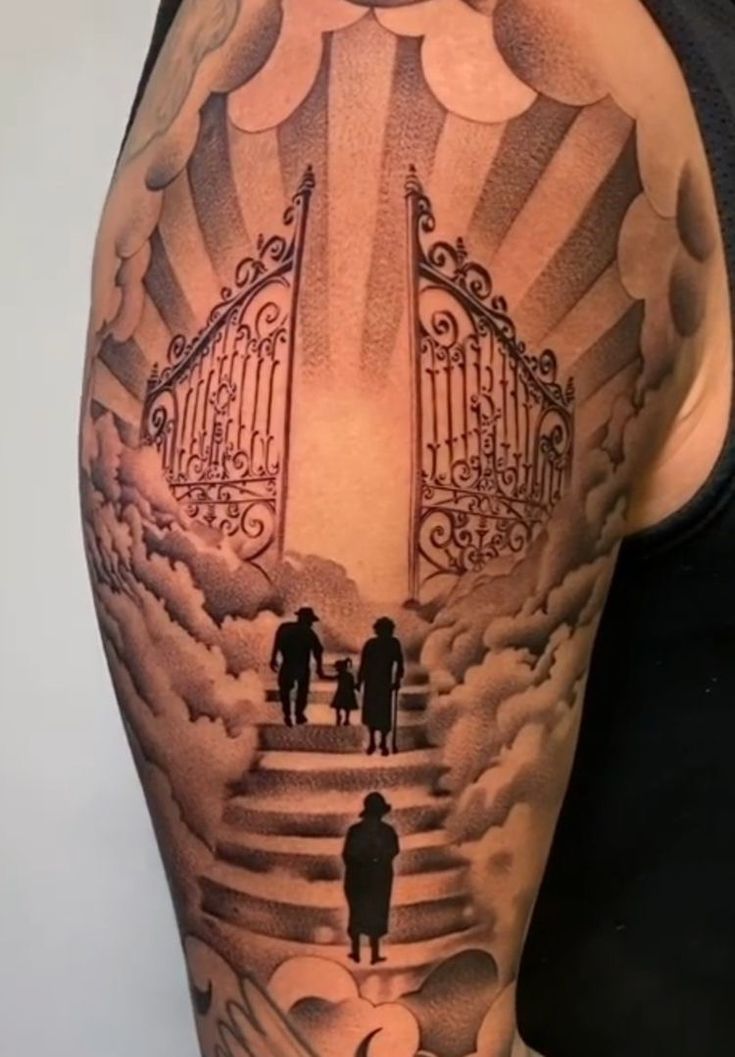 a man with a tattoo on his arm that has an image of two people walking up stairs