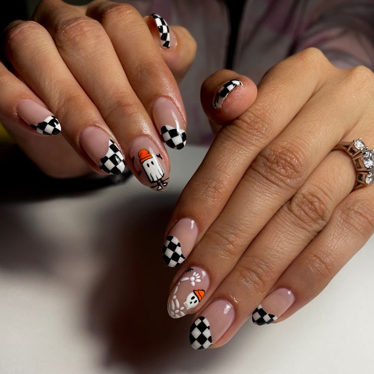 halloween nails w/ skeleton and ghost with beanies, and checkered nails! Nails were done by @fabdoesmynails on Instagram ! Ghost And Checkered Nails, Halloween Girlie Nails, Cute Fall Nail Designs Acrylics, Cowgirl Ghost Nails, Cute Unique Nail Ideas, Fall Girly Nails, Halloween Checkered Nails, Groovy Halloween Nails, Halloween Gel X Nails