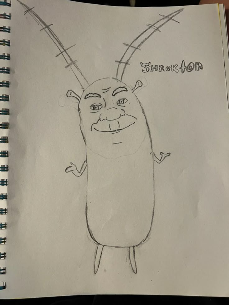 a pencil drawing of a cartoon character with horns on it's head and eyes