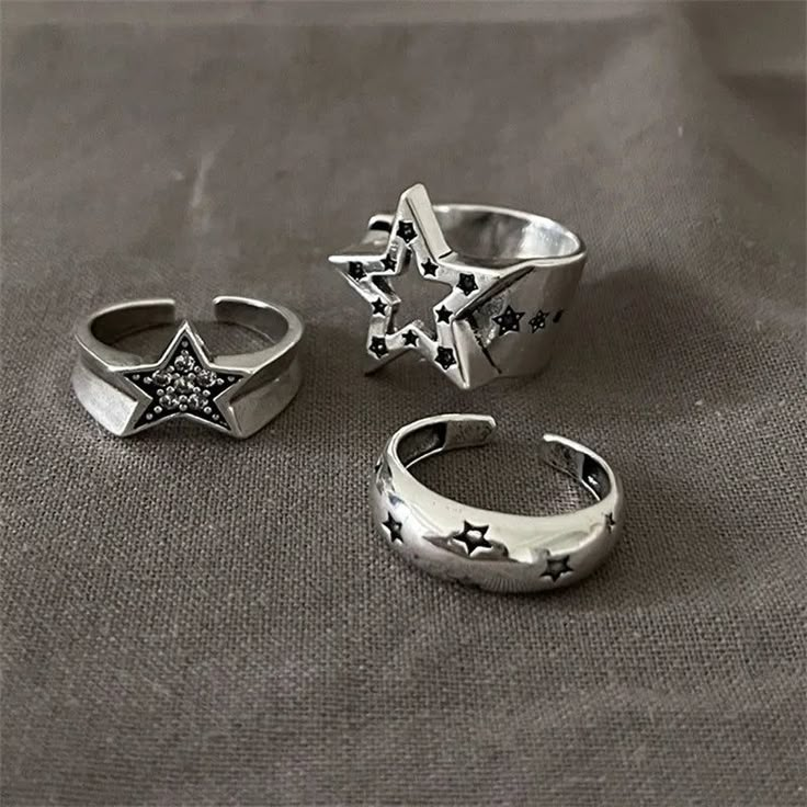 Delight in the star-shaped design of our Y2K Adjustable Rings! Crafted with Cubic Zirconia and Zinc alloy, these rings will have you looking stellar. DETAILSPattern Type: StarMaterial: Cubic ZirconiaMetals Type: Zinc alloy Egirl Jewelry, Rings Y2k, Lover Fashion, Hollow Ring, Tension Setting, Y2k Accessories, Gothic Vintage, Jewelry Accessories Ideas, Geometric Star