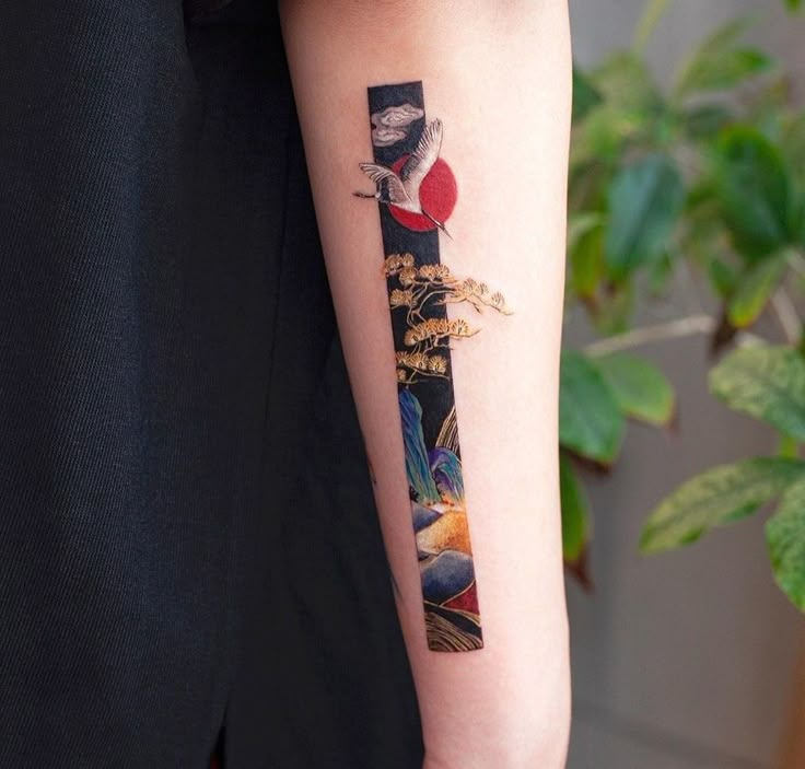 a person with a tattoo on their arm