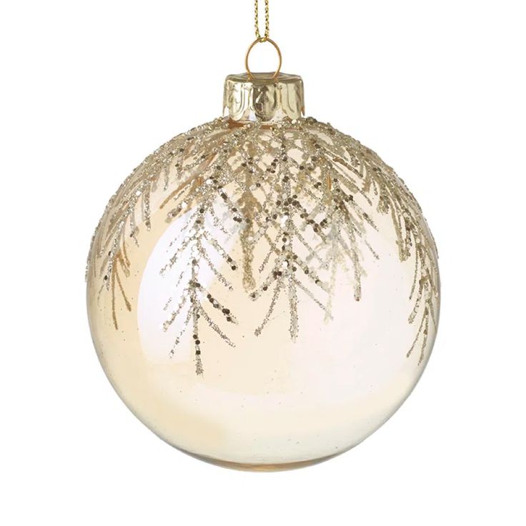 a glass ornament hanging from a chain on a white background with snow flakes