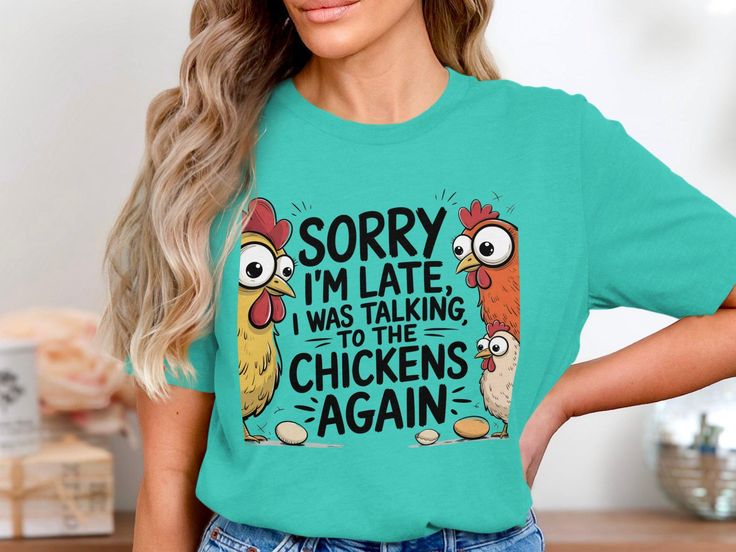 a woman wearing a t - shirt that says sorry i'm late, i was talking to the chickens again