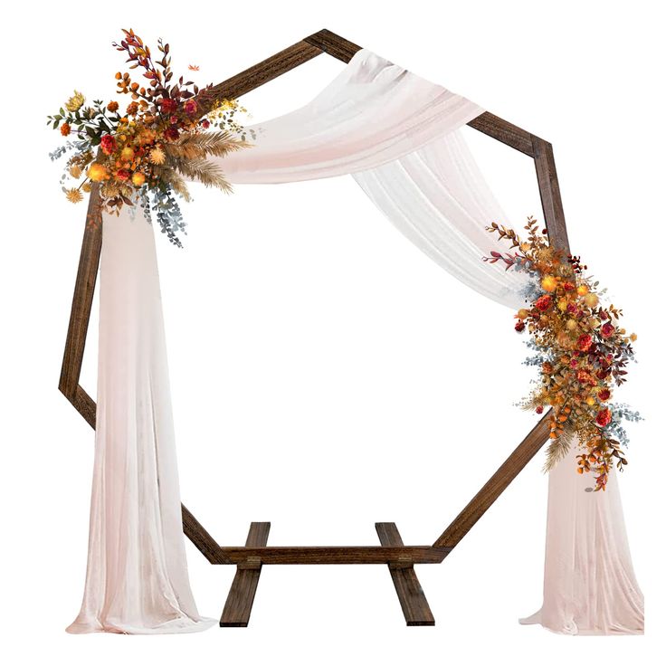 a wedding arch decorated with flowers and fabric