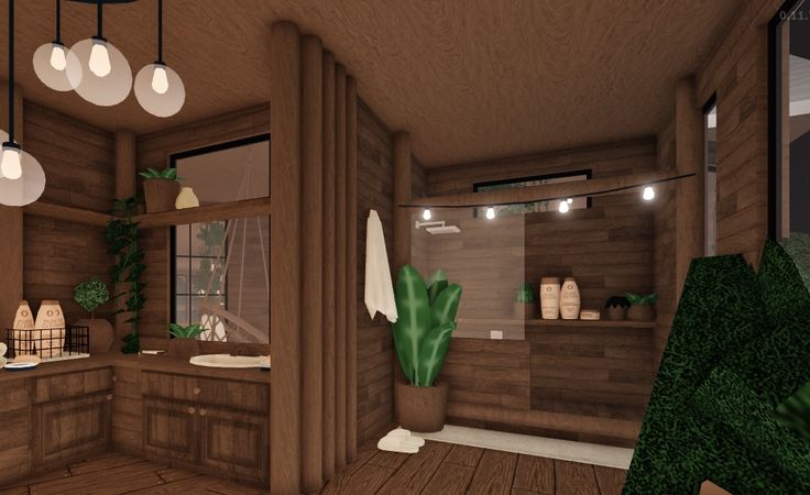 a very nice looking bathroom with some plants in the corner and lights hanging from the ceiling