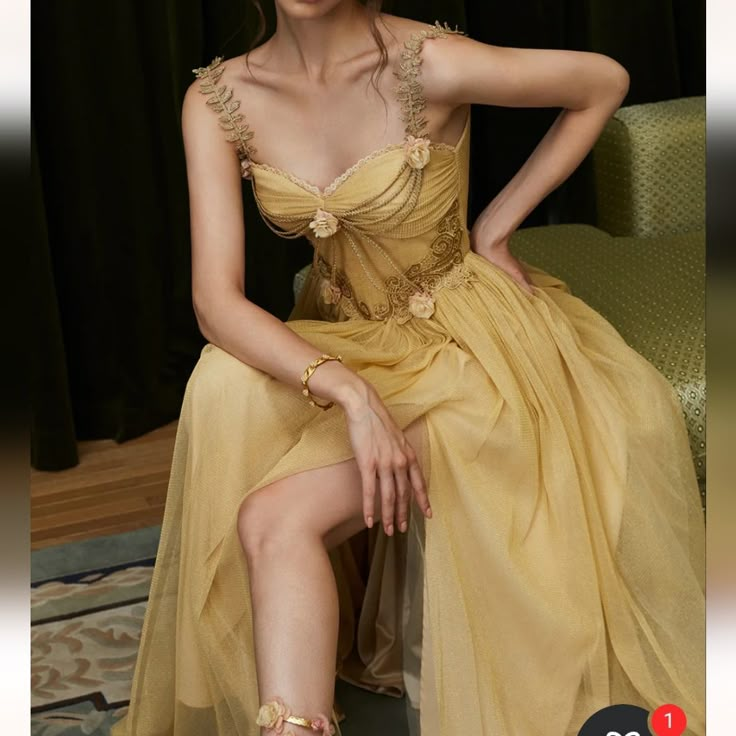 Questions? Leave A Comment Below! Old New York Prom Dresses, Yellow Party Dress Classy, Gold And Black Dress Prom, High Femme Outfits, Maximalist Prom Dress, Prom Masquerade Theme Dress, Greek Prom Dress, Fae Aesthetic Clothes, Formal Winter Dresses