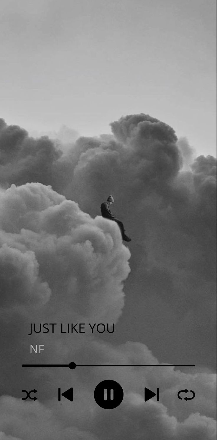 a black and white photo with the words just like you in front of some clouds