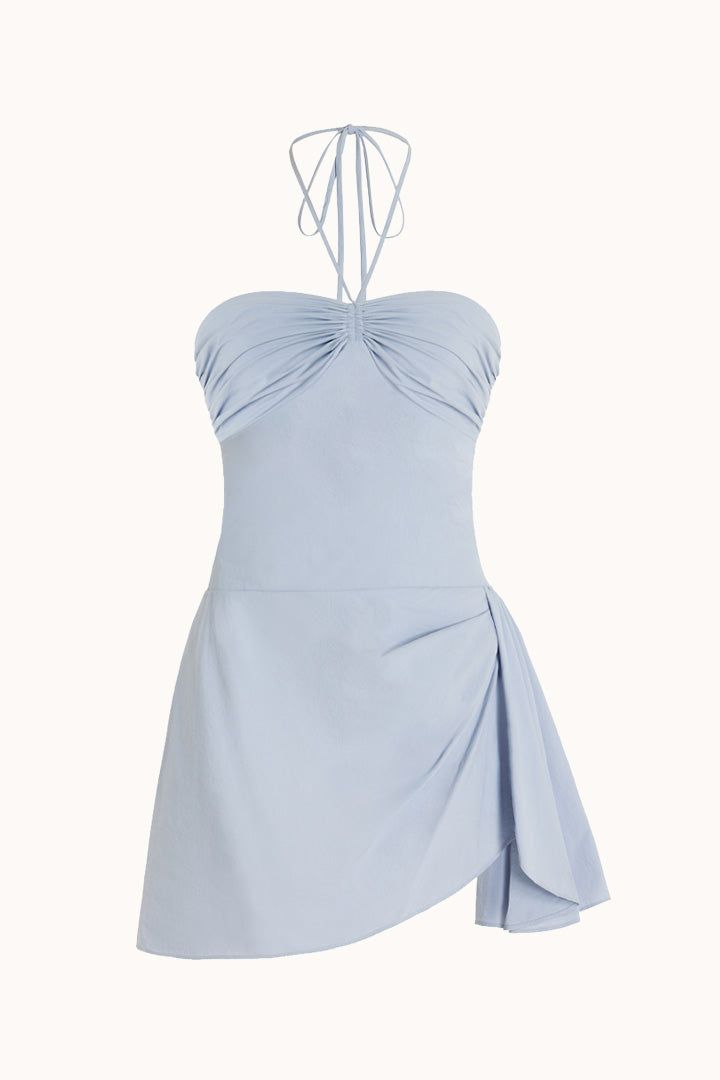 The Bardot Mini Dress is mindfully crafted in NYC from recycled polyamide. This halter dress features a ruched bust and asymmetrical gathered and ruched skirt, with a smocked back detail for adjustability and comfort. Lightweight, water resistant and breathable, The Bardot Mini Dress is a versatile summer staple - perfect for all warm-weather occasions, from beach trips and poolside hangs to summer nights out. Please note this item is not considered swimwear. Limited units available. Orseund Iri Blue Flowy Mini Dress, Blue Halter Mini Dress, Powder Blue Mini Dress, Hoco 2024 Dresses, Halter Hoco Dress, Formal Beach Dress, Tiffany Blue Dresses, Blue Dresses Short, Blue Dress Flowy