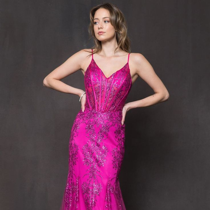 The Delightful Dress Has A Mermaid Silhouette. Thin Straps Support The Bodice Decorated With Charming Patterns Of Sparkling Sequins. The Structural Corset With Underwire Has A Functional Zipper At The Back That Ensures A Secure Fit Of The Dress. The Floor-Length Skirt Has A Short Train That Gives The Image Completeness. Length: Long Colour: Magenta Neckline: V-Neck Silhouette: Mermaid Sleeve: Sleeveless, Straps Back: Zipper Skirt: Short Train Embellishments: Sequins Occasion: Romantic Date/Eveni Magenta Wedding, Evening Dinner, Wedding Dress Sequin, Plus Size Prom, Trumpet Gown, Zipper Skirt, Romantic Date, Dinner Wedding, Skirt Short