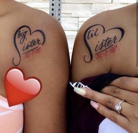 two women with tattoos on their arms and one has a red heart in the middle