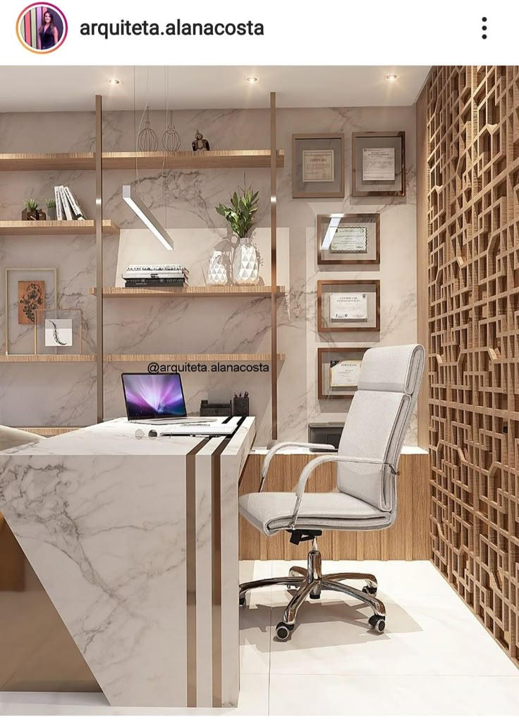 an office desk with a laptop computer on it in front of a book shelf and shelving