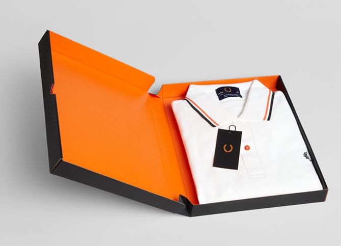 an open box with a white shirt inside