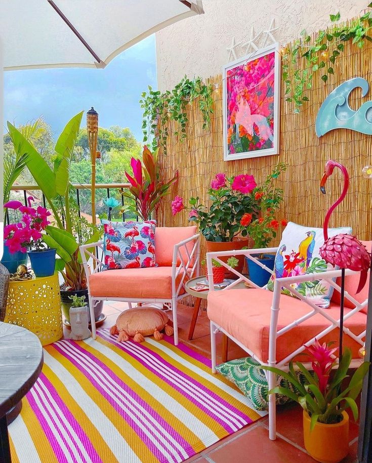 an outdoor patio with colorful furniture and potted plants