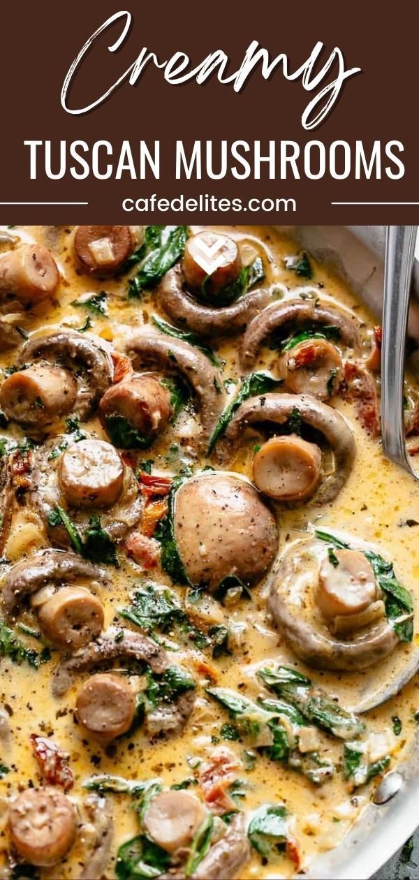 a white plate topped with mushroom and spinach casserole next to a fork