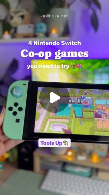 a person holding up a nintendo wii game controller in front of a computer screen with the title, 4 nintendo switch co - op games you need to try