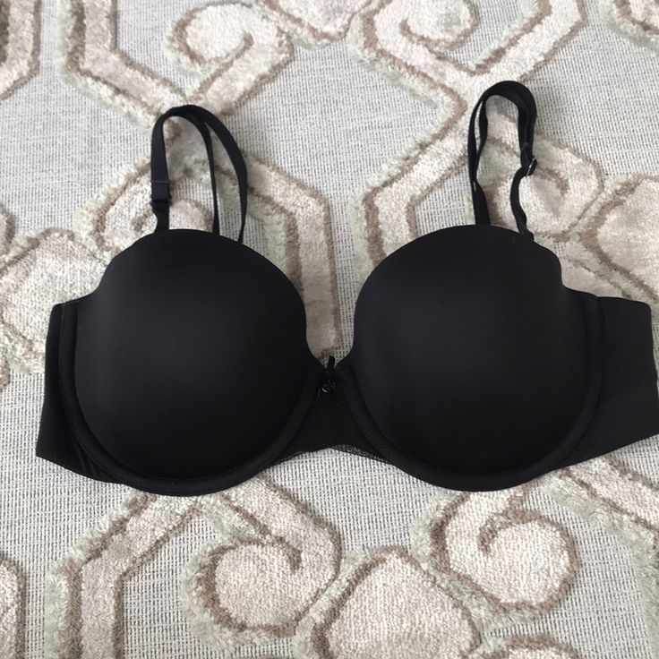 Never Worn. No Tag Victoria's Secret Bra With Built-in Bra, Classic Black Bra With Medium Bust Support, Classic Black Bra With Removable Pads, Classic Black Seamless Bra, Victoria's Secret Solid Color Bra With Padded Cups, Victoria's Secret Solid Bra With Padded Cups, Victoria's Secret Bra With Padded Cups, Black Seamless Bra By Victoria's Secret, Victoria's Secret Black Seamless Bra