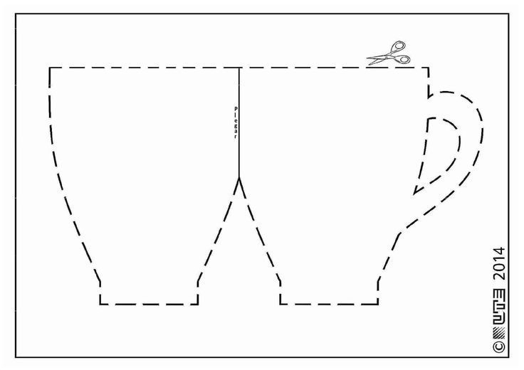 a paper cut out of a coffee cup with scissors on top and the outline for it