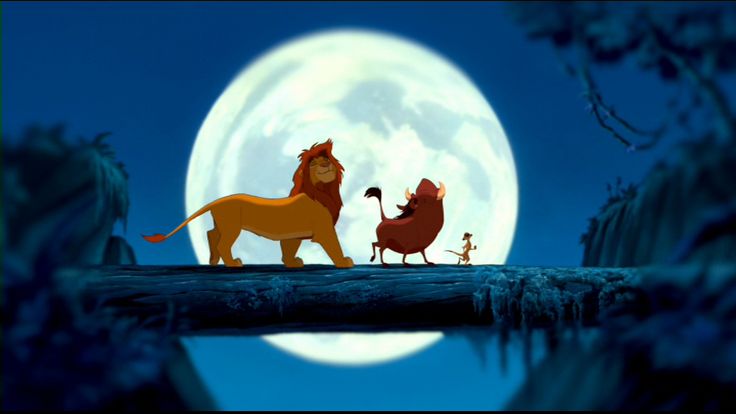 the lion and the mouse are standing in front of a full moon