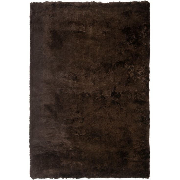 a brown rug on a white background