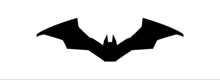 the batman symbol is shown in black and white, with an open - mouthed bat on it