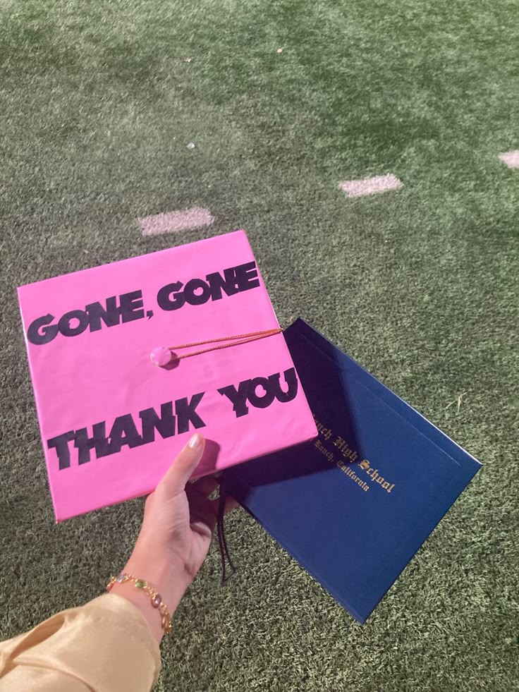 a pink graduation cap with the words gone, gone, thank you written on it