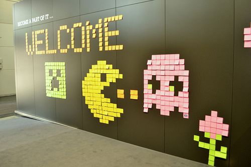 a wall with sticky notes on it that say welcome to the game console and an image of a pink pony