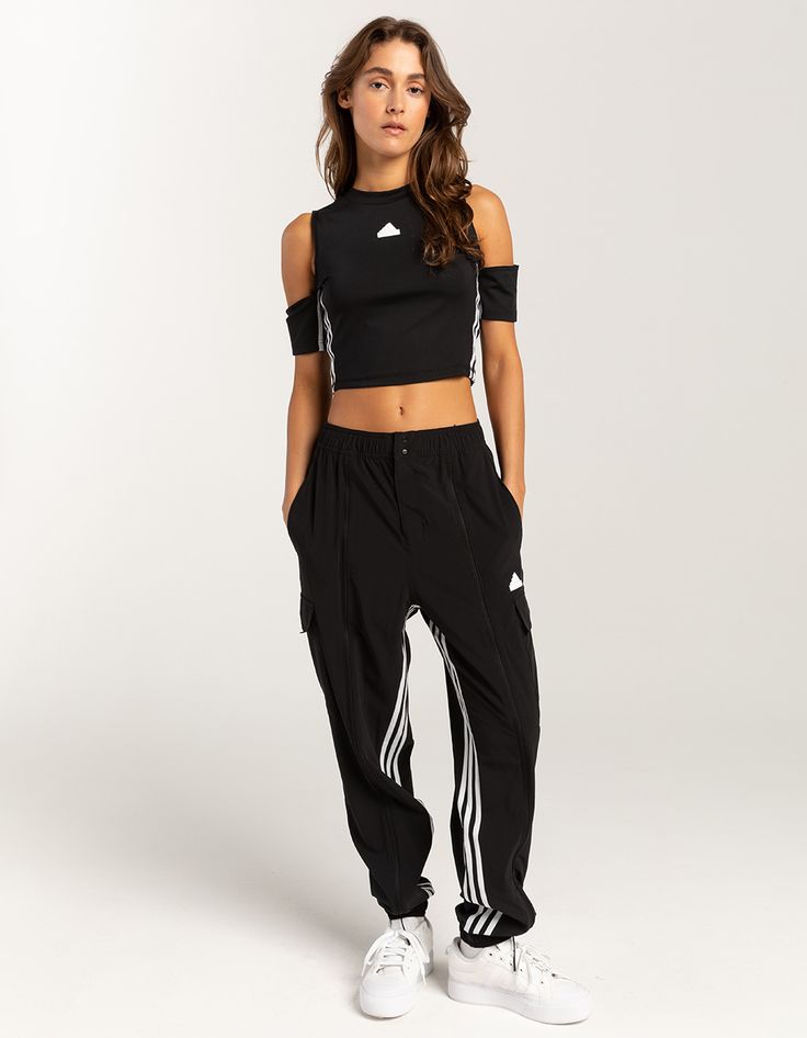 Adidas Dance Cargo Pants. Dancing Is A Form Of Self Expression That Requires Both Fashion And Function. These Adidas Pants Deliver On Both, Featuring Versatile Zip Styling, Aeroready Tech That Manages Moisture And A Stretch Woven Fabric That Allows For Unrestricted Movement. Whether Heading To A Dance Class Or Meeting Friends For A Night Out, These High-Waisted Pants Transition Effortlessly From Day To Night. However You Style Them, These Pants Will Have You Ready To Move Through Each Moment With Confidence And Comfort. Loose Fit With High Rise. Elastic Waist With Drawcord. Stretchy Fabric. Aeroready. Front Pockets And Cargo Pockets. Full Front Leg Zips Open For Different Looks. Elastic Cuffs. Moisture-Wicking. 87% Recycled Polyester, 13% Elastane. Machine Wash. Imported. Model Is Wearing Hiphop Dance Outfit Dancers, Dance Class Outfits, Sporty Goth, Hiphop Dance Outfit, Gym Fashion Women, Black Cargo Pants Women, Womens Cargo Pants, Dance Class Outfit, Adidas Women Fashion