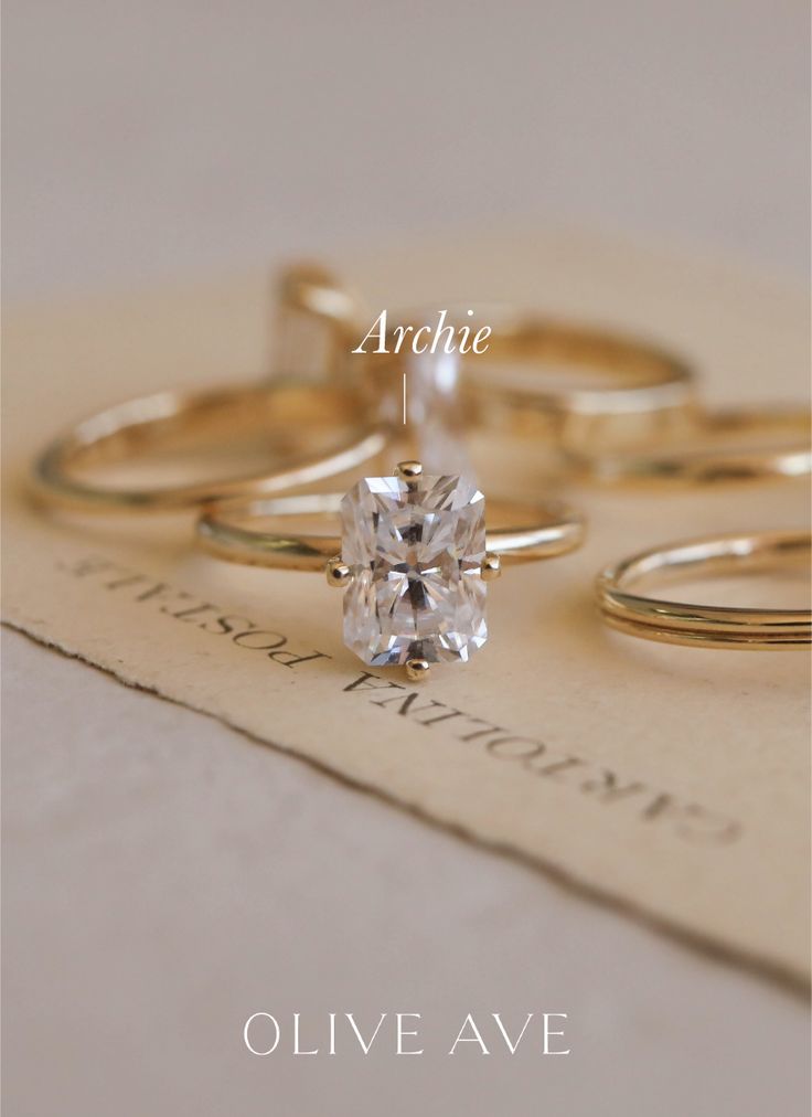 an image of wedding rings on top of a piece of paper with the words archive above it