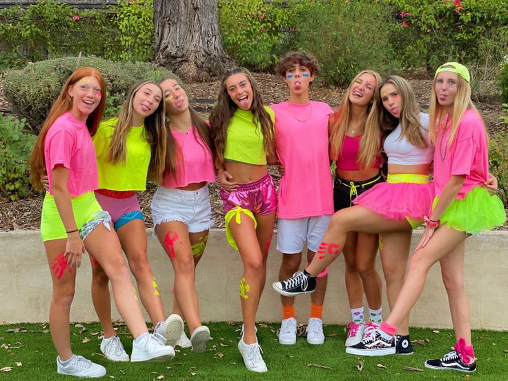 a group of young women standing next to each other