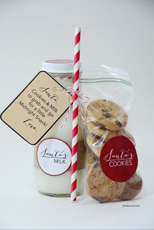 cookies and milk in a jar next to a candy cane