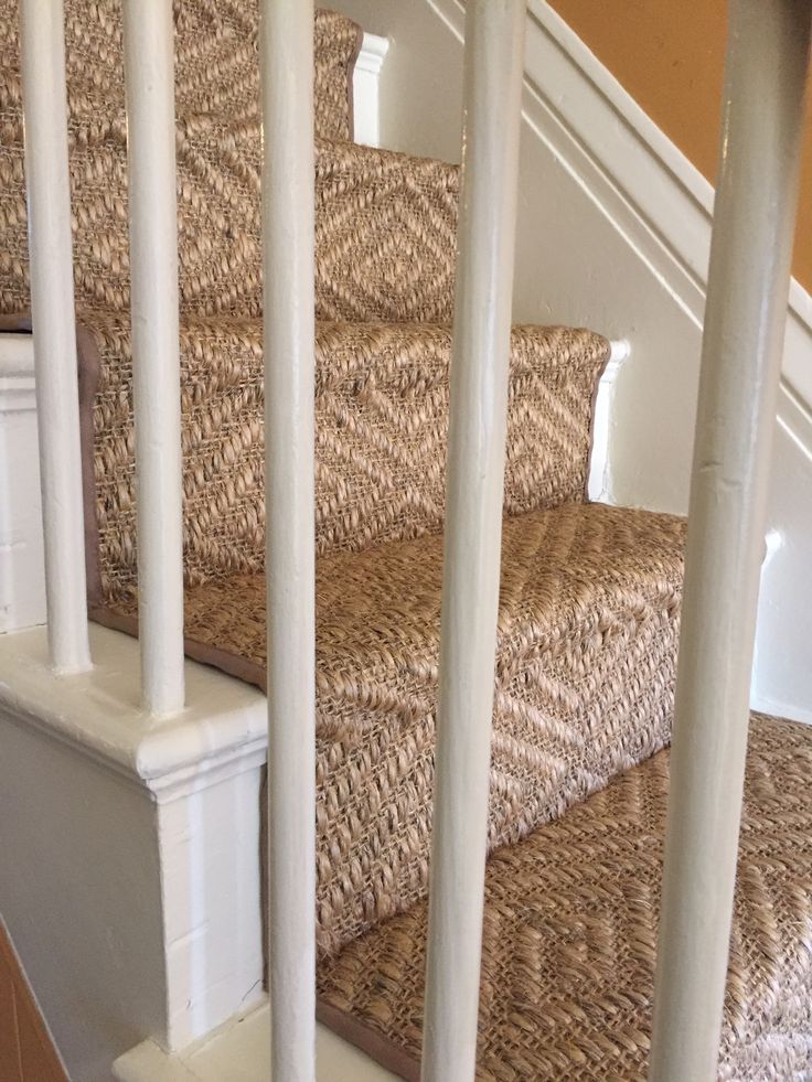 the stairs are made of wicker and have white balconies on each handrail