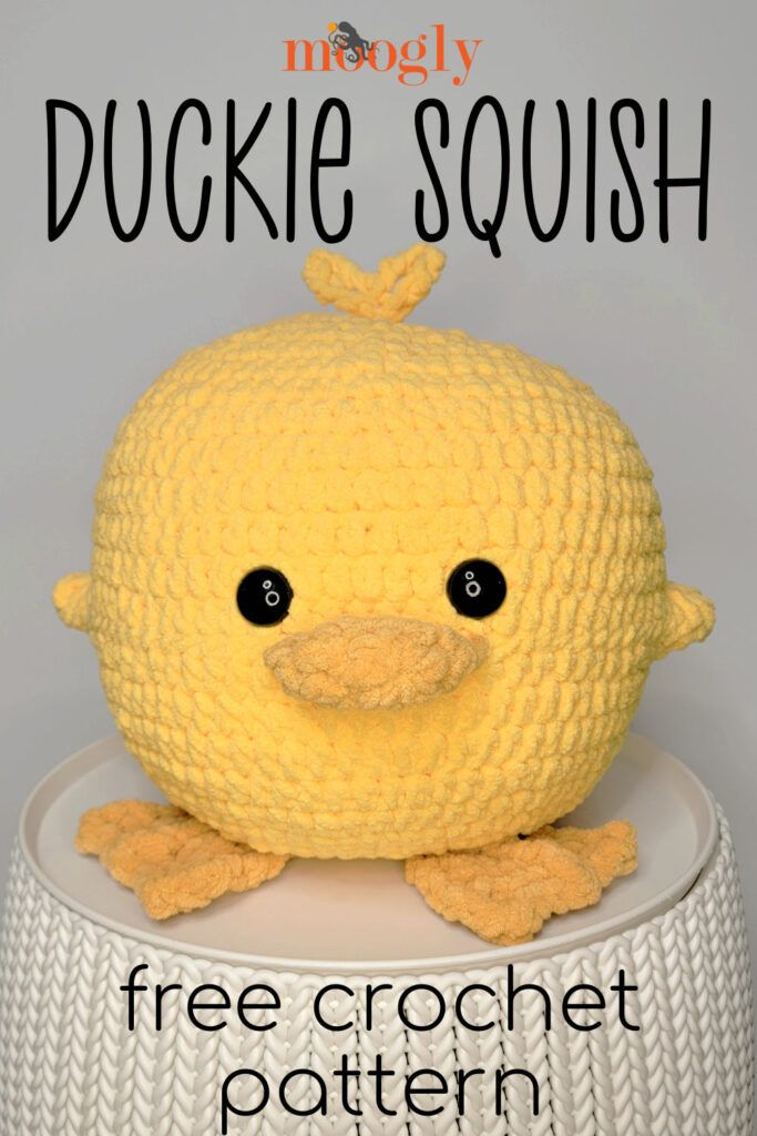 a crocheted stuffed animal sitting on top of a white stool with the words free crochet pattern