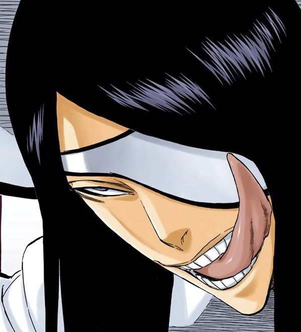 a close up of a person with black hair and an anime smile on their face