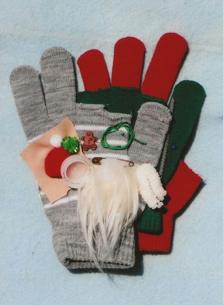 gloves and other items are laid out on a blanket