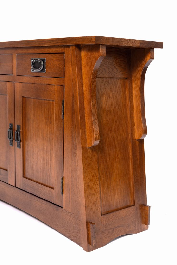 a wooden cabinet with two doors and drawers