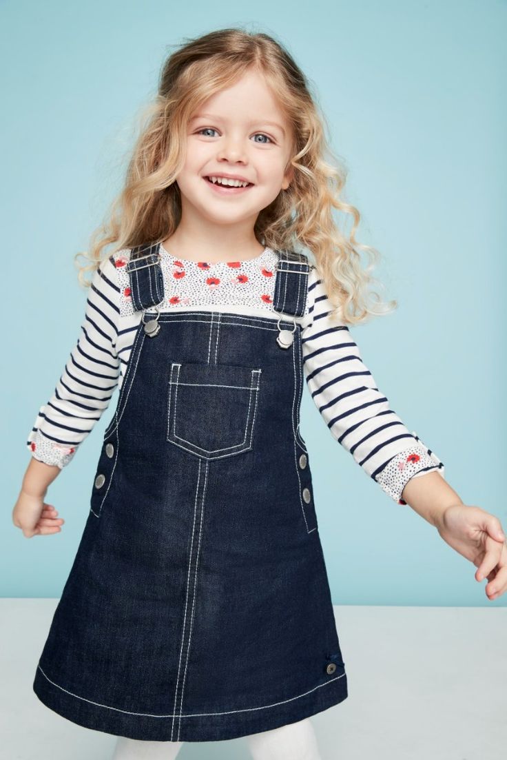 Dark denim girls dungaree with white navy striped long sleeve t-shirt. Floral print detailing. Boys Chinos, Girls Spring Outfits, Denim Dungaree, Childrens Clothing Stores, Stylish Kids Outfits, Designer Kids Clothes, Kids Coats, Stylish Kids