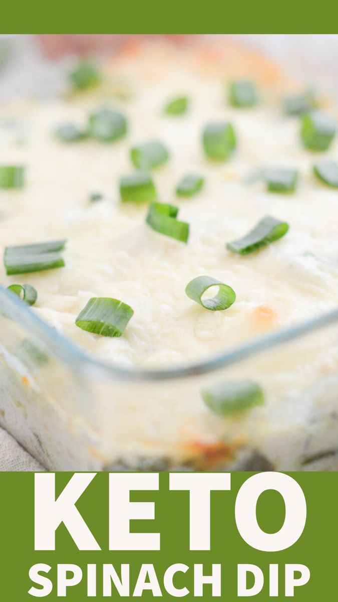 a casserole dish with green onions and cheese on top, in a glass baking dish