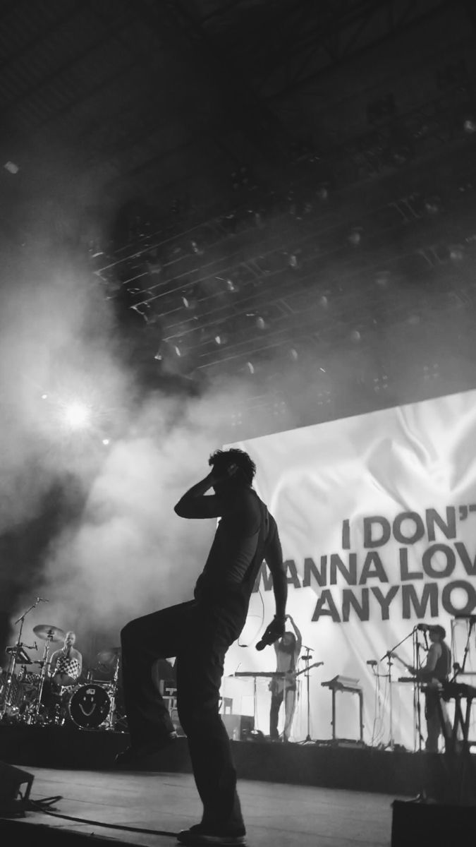 a man standing on top of a stage