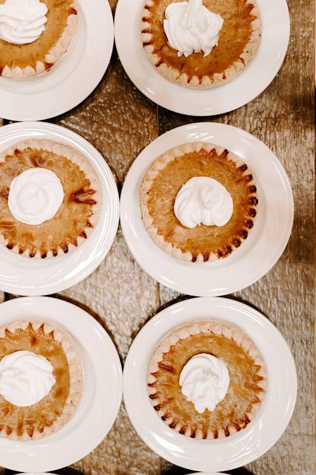 six pies with white frosting on them are arranged in the shape of circles