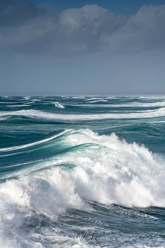 the ocean is full of white foamy waves