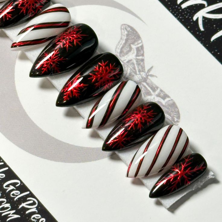 Christmas Chrome Goth Simple Nails, Holiday Horror Nails, Red Black And White Acrylic Nails, Vampire Gel Nails, Christmas Nails Nightmare Before, Red And Black Nails Christmas, Red And Black Winter Nails, Black And White Xmas Nails, Spooky Xmas Nails