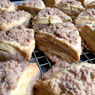 several pieces of cake sitting on top of a cooling rack