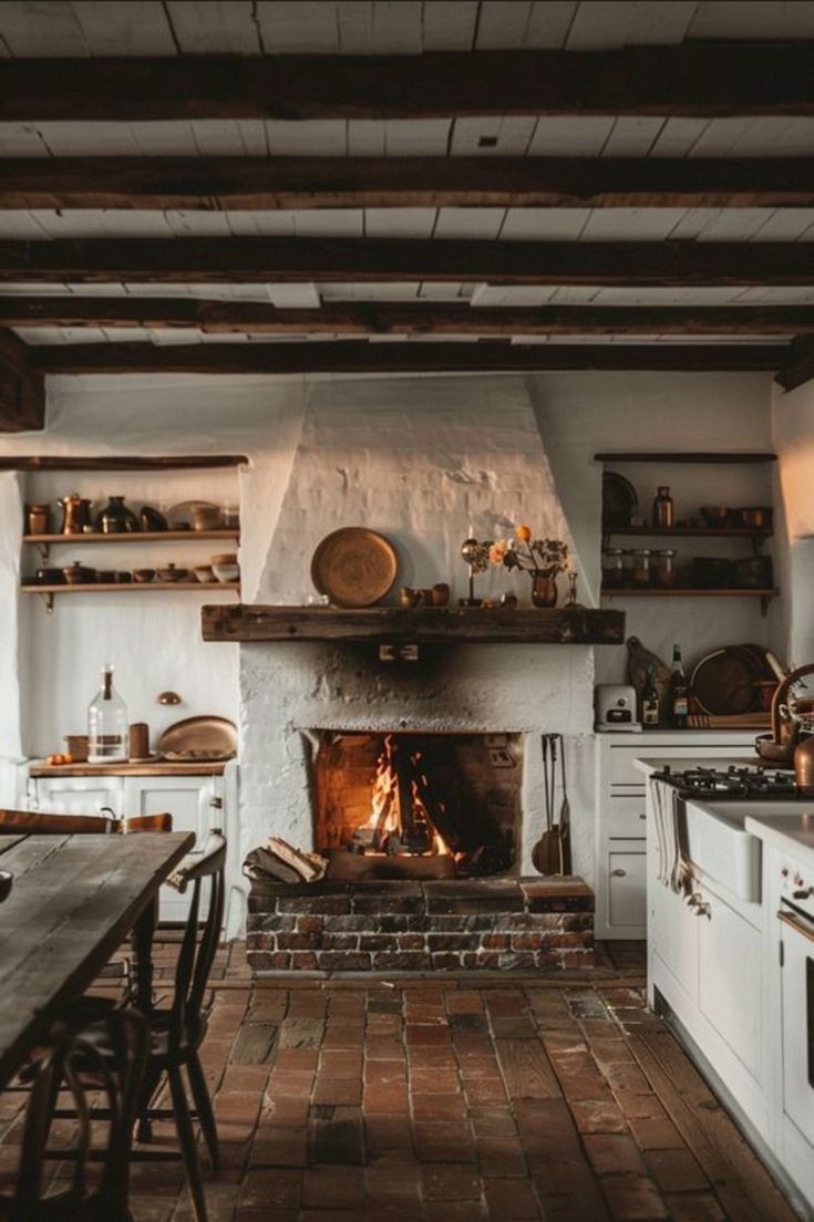 a rustic kitchen with an open fire place