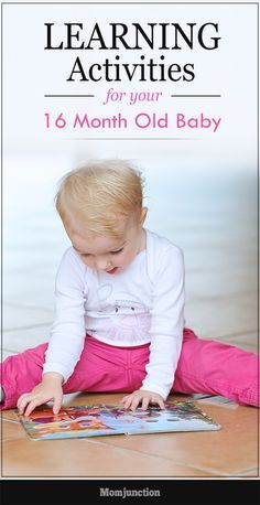 a baby is sitting on the floor and playing with an old book that says learning activities for your 1 - month old baby