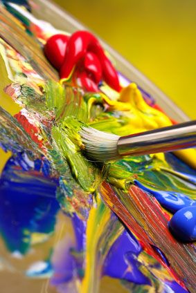 the paintbrush is being used to paint colorful paintings