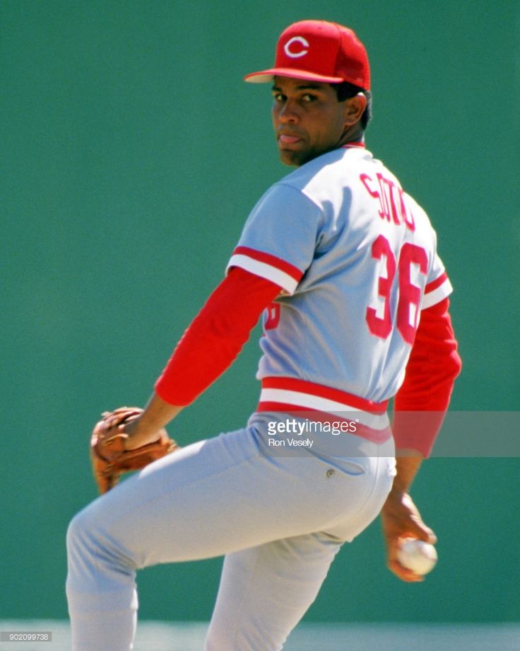 a baseball player in the process of throwing a ball stock - fotor / getty images