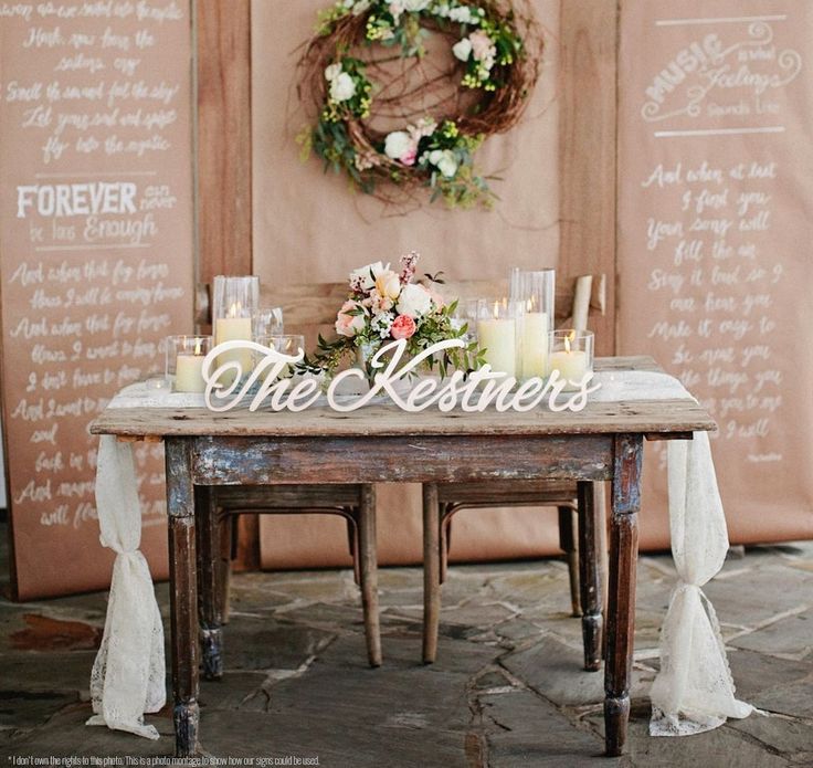 a table with candles and flowers on it