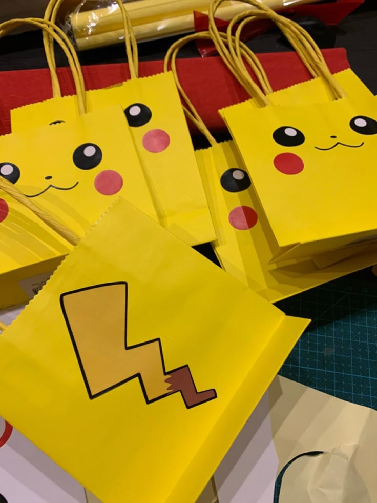 yellow paper bags with faces and eyes on them