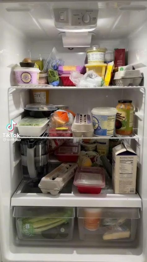 an open refrigerator filled with lots of food